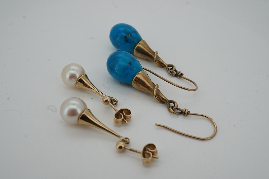 A modern pair of 9ct gold and cultured pearl set drop earrings, 27mm and one other pair of yellow metal drop earrings.